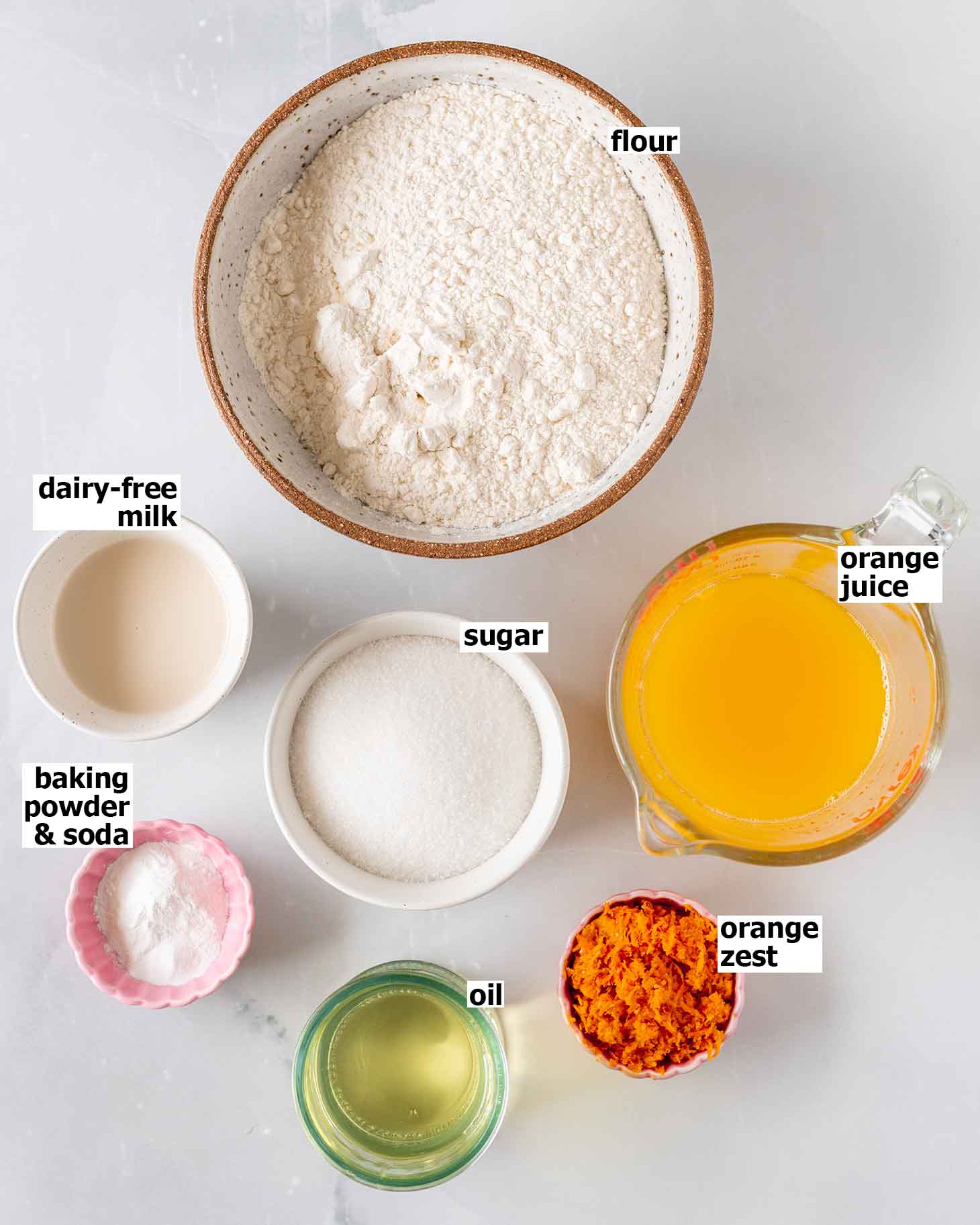 Flay-lay of ingredients for vegan orange cake.