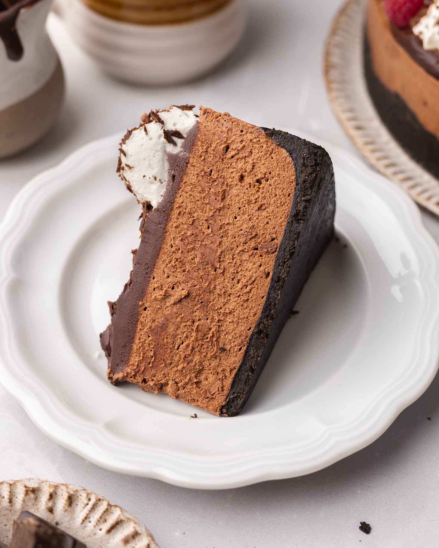 Another close up of a slice of chocolate cheesecake.