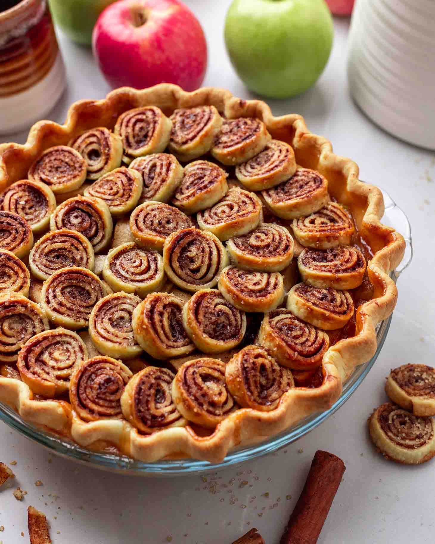 Close up of apple pie and cinnamon swirl top.