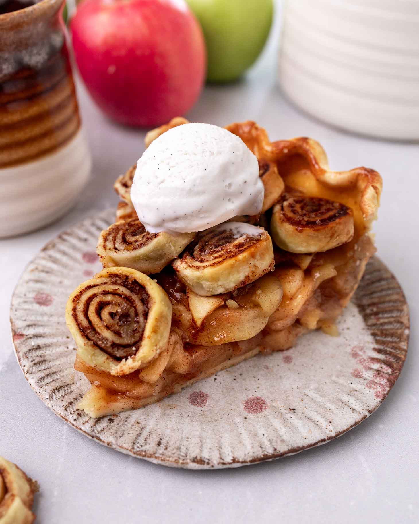 One slice of apple pie with scoop of ice cream.