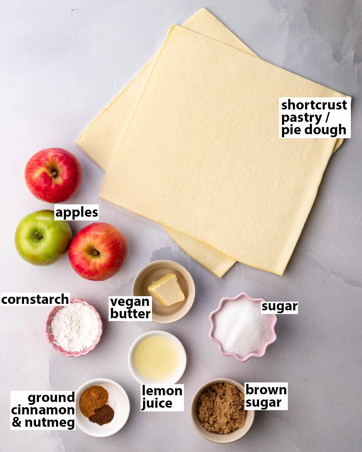 Flat-lay of ingredients for apple pie.